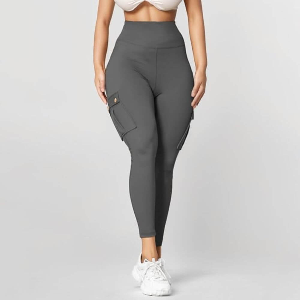 Graue Shaping-Leggings mit Seitentaschen – Praktisch für unterwegs.