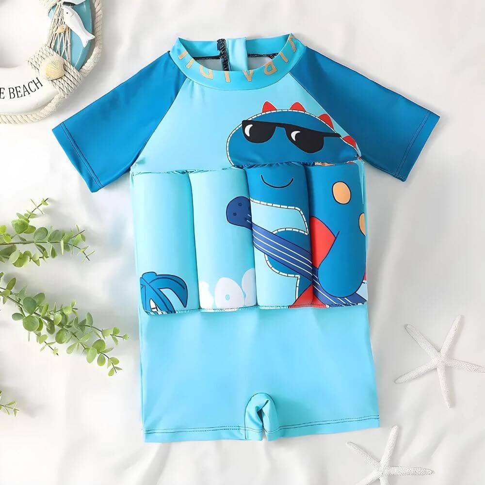 SunnySplash Schwimmanzug – Blau mit Dinosaurier-Motiv, UV-Schutz & maximaler Komfort.
