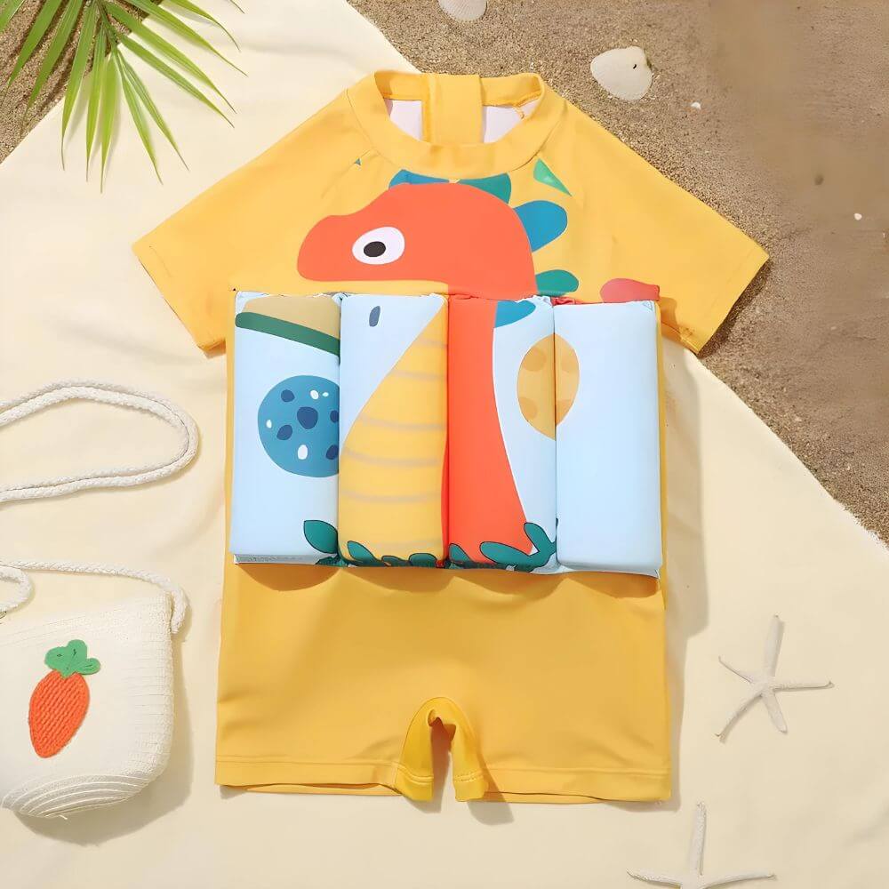 Sicher schwimmen mit SunnySplash – Gelber Kinder-Schwimmanzug mit Dino-Print & SPF 50+