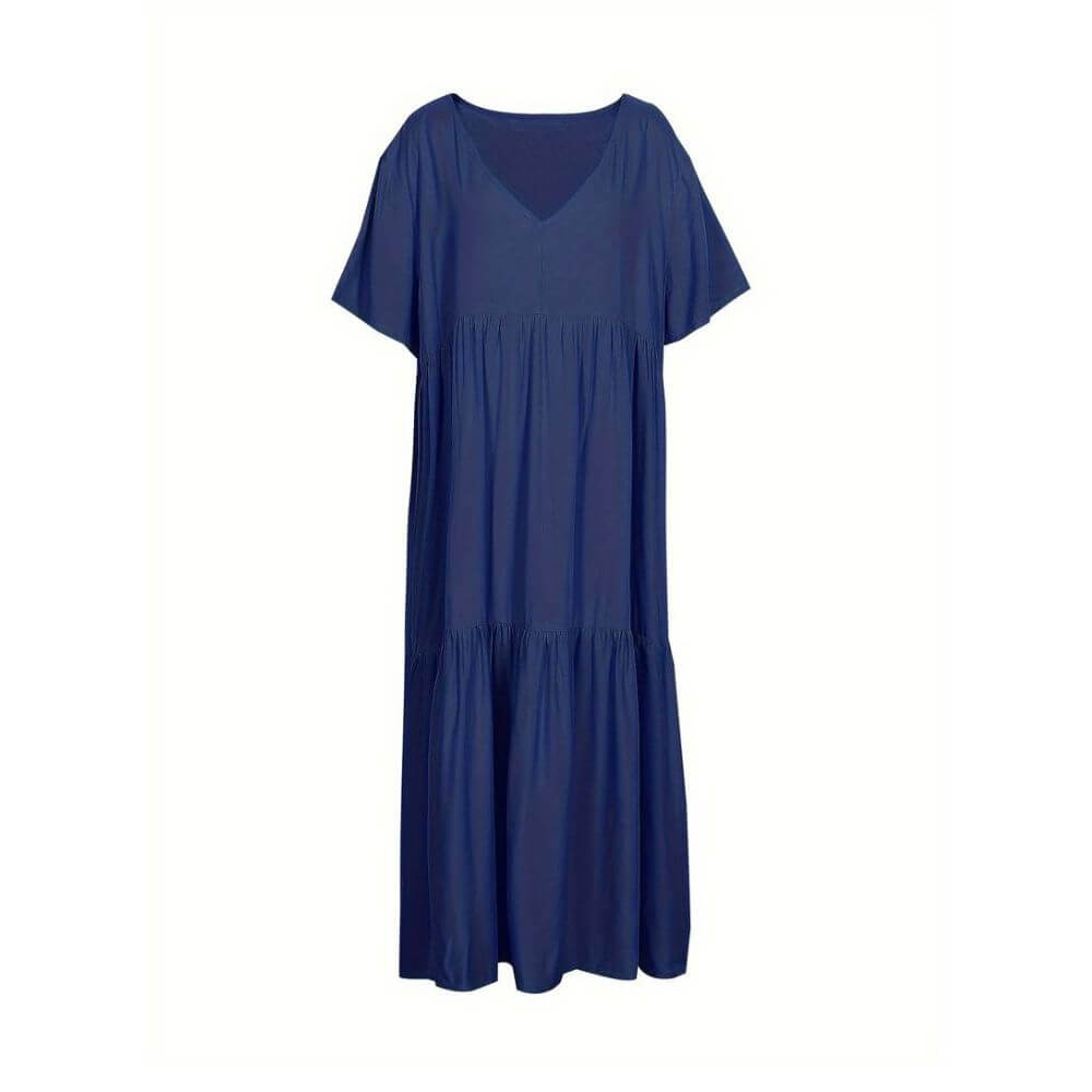Frisches blaues Coraline Sommerkleid, bietet komfortable Passform und Atmungsaktivität für den ganzen Tag.